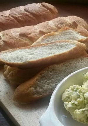 A picture of Homemade Baguettes with Garlic Dill Butter.
