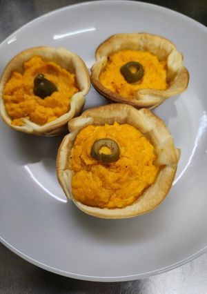 Una foto de Minitartitas de pollo y zanahorias