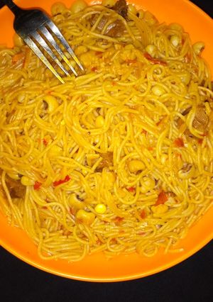A picture of Jallof spags and beans.