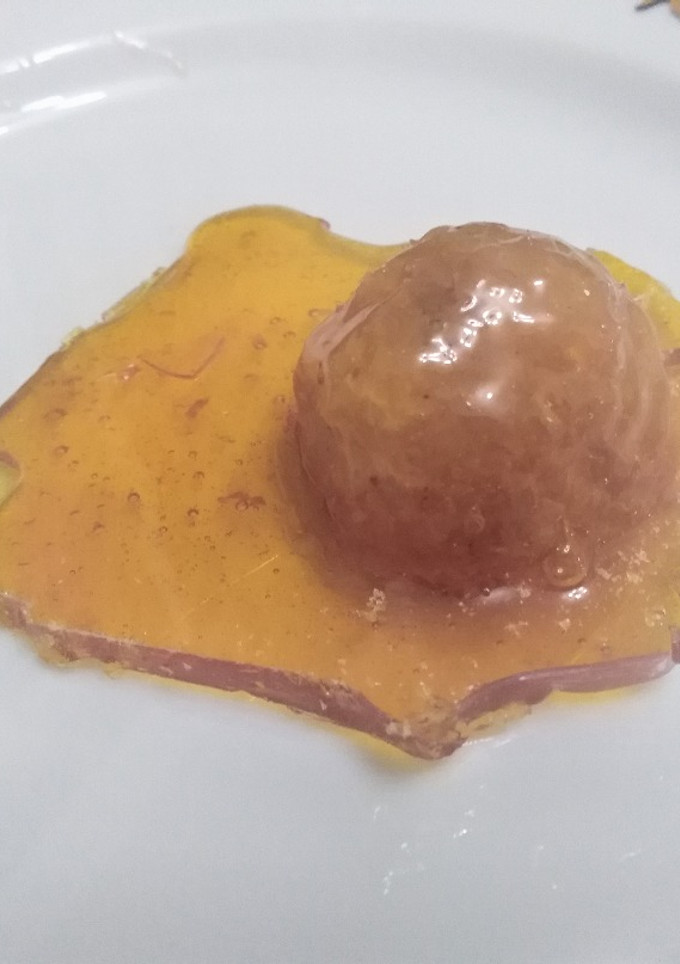 Una foto de Bolitas de coco acarameladas