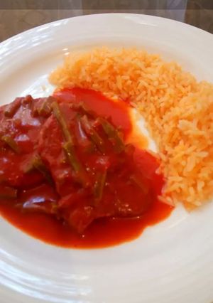 A picture of Shrimp Patties in Guajillo Sauce with Nopales.