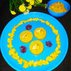 A picture of Mango Almond saffron Sheera.