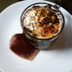 A picture of Cold coffee with vanilla ice cream.