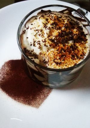 A picture of Cold coffee with vanilla ice cream.