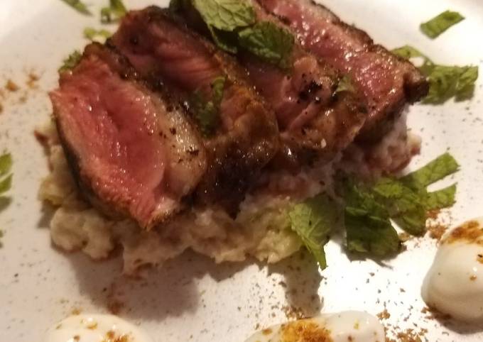 Duck breast with Indian spice rub on cauliflower coconut puree