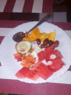 A picture of Mixed fruits,vegetables and natural yoghurt.