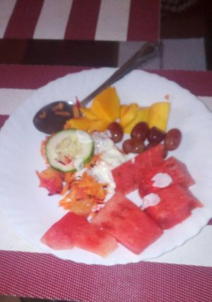 A picture of Mixed fruits,vegetables and natural yoghurt.