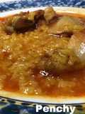 Arroz caldoso con alitas de pollo adobadas