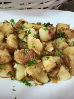 Una foto de Patatas de guarnición al toque de miel y jengibre