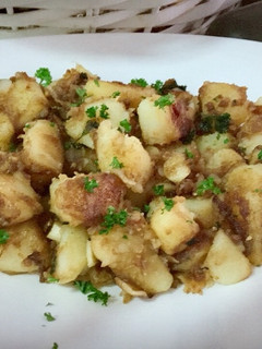 Una foto de Patatas de guarnición al toque de miel y jengibre