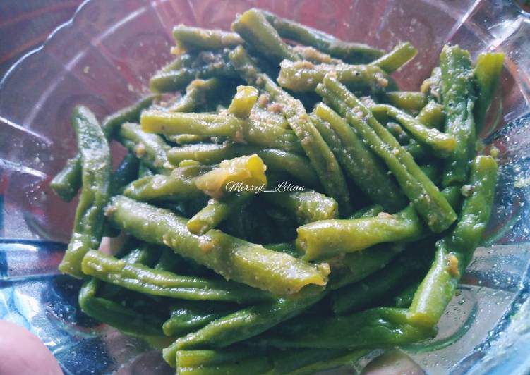 Cara meracik Tumis buncis bumbu kuning yang sempurna