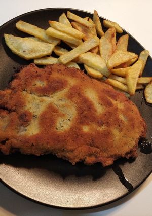 Una foto de Cachopo de jamón serrano y queso