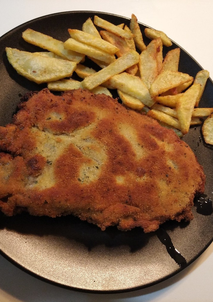 Una foto de Cachopo de jamón serrano y queso
