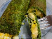 Una foto de canelones de acelga