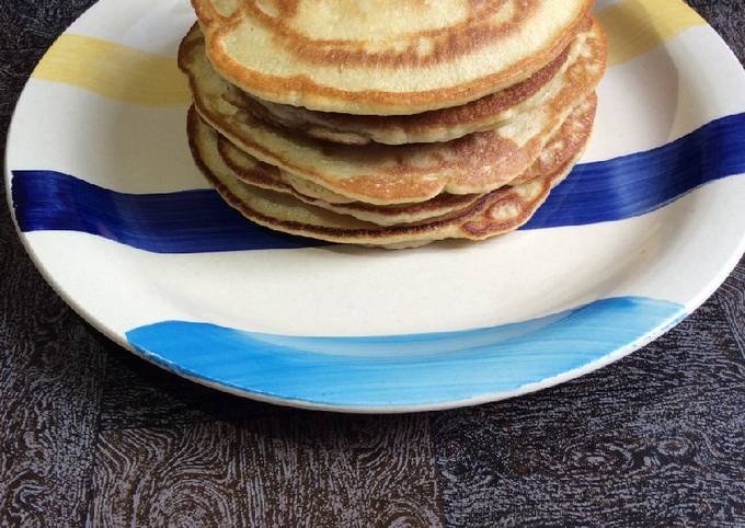 Premium Photo | Stack of fresh homemade plain pancakes served on white plate