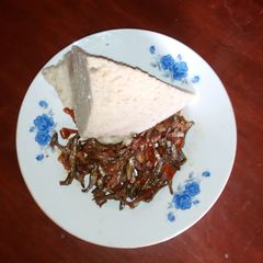 A picture of Fried omena with ugali.