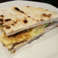 A picture of Omelette sandwich.