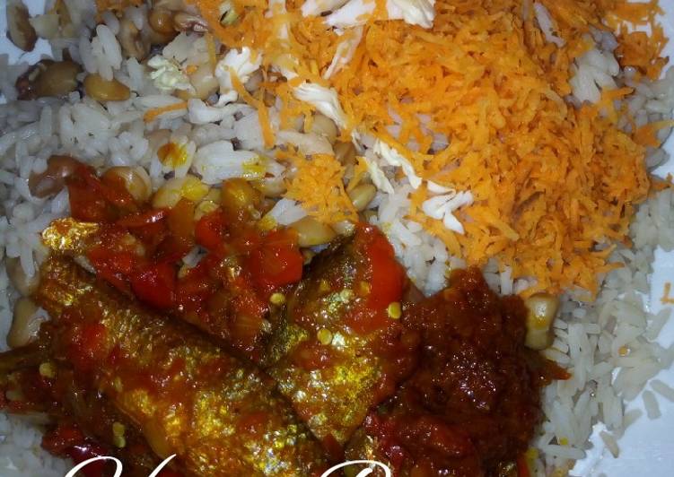 Rice and beans with Stew and fish
