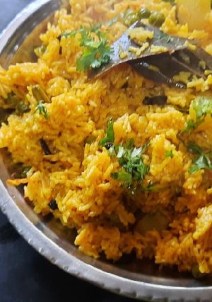 A picture of Green peas and potato pulao.