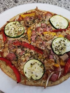 Una foto de Pizza con masa de quinoa