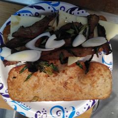 A picture of Steak and Onion sandwich.