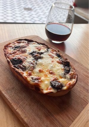 Una foto de Tartizza de morcilla y queso azul