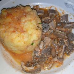 A picture of Mashed potatoes and matumbo.