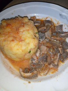 A picture of Mashed potatoes and matumbo.