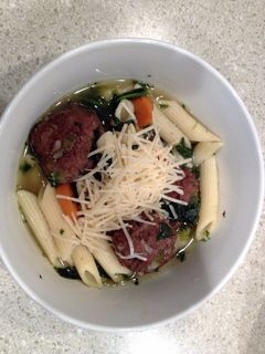 A picture of Italian Wedding Soup with Penne Pasta.
