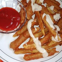 A picture of Potato fries with crispy coating.