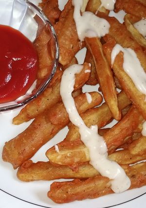 A picture of Potato fries with crispy coating.