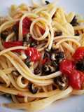 Linguine con lumachine di mare e pomodorini