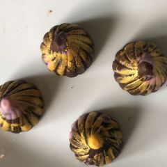 A picture of Chocolate dry fruit modak.