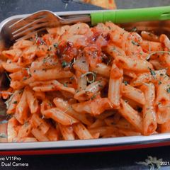 A picture of Red sauce pasta.
