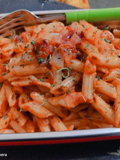 A picture of Red sauce pasta.