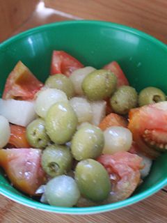 Una foto de Ensalada de tomate y melón