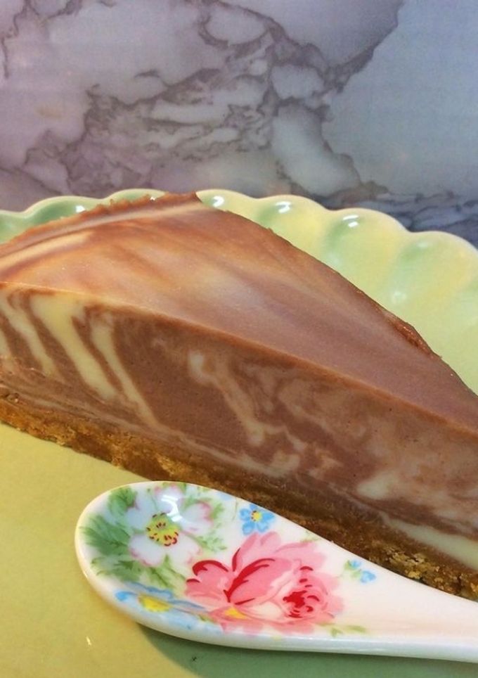 Una foto de Tarta de queso y chocolate