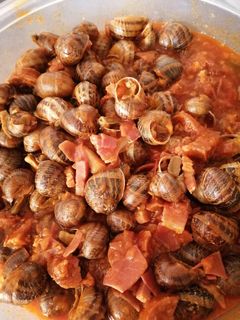 Una foto de Caracoles en salsa