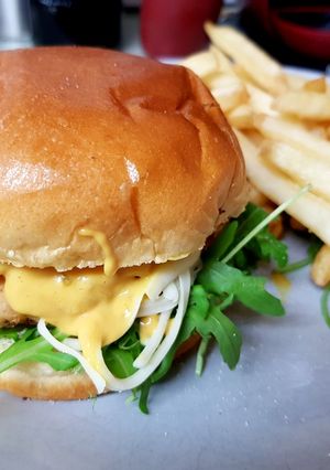 A picture of My Chicken & Bacon in parmesan Breadcrumbs on a Bun.
