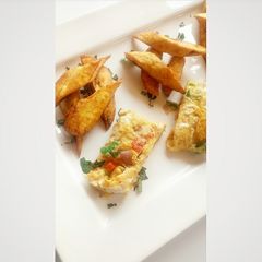A picture of Fried plantain with fried egg.