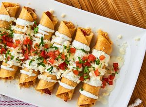 Una foto de Flautas de Pollo y Queso