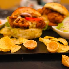 A picture of Whosayna’s Crispy Chicken Burger.