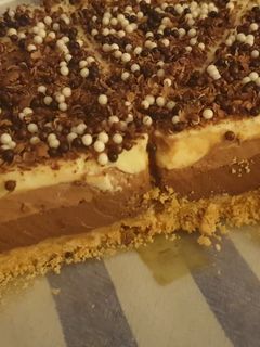 Una foto de Tarta tres chocolates