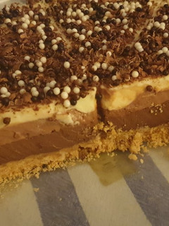 Una foto de Tarta tres chocolates