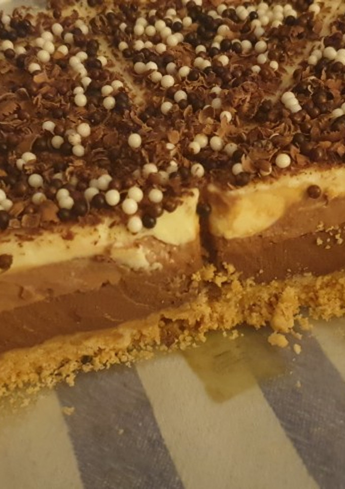 Una foto de Tarta tres chocolates