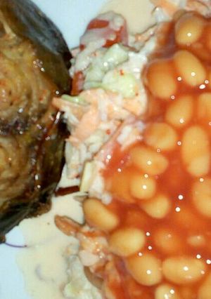 A picture of Barbeque fish and salad.