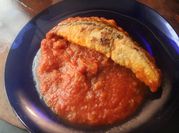 Una foto de sofrito de tomate