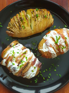 Una foto de Patatas hasselback