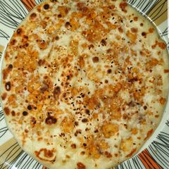 A picture of Chicken Qeema Naan.