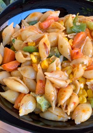 A picture of Macaroni with veggies.